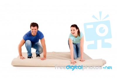 Laying A Carpet Stock Photo
