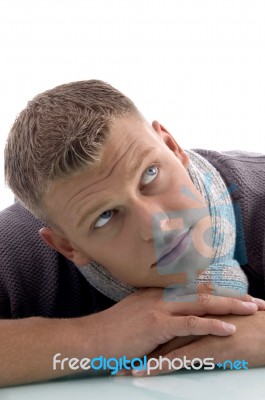 Laying Handsome Male Looking Aside Stock Photo