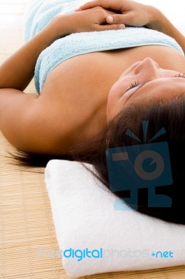 Laying Woman In Towel Stock Photo