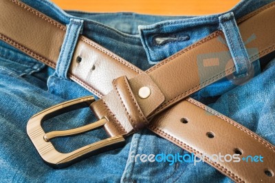 Leather Belt On  Jeans Pants Background Stock Photo