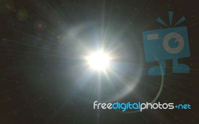 Lens Flare Light Over Black Background. Easy To Add Overlay Or Screen Filter Over Photo.sunburst With Lens Flare Light Over Black Background Stock Image