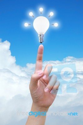 Light Bulb In Women Hand Stock Photo