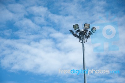 Light Pole On Blue Sky Background Stock Photo