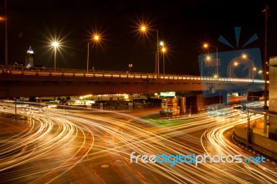 Light Vehicles In The Intersection Stock Photo