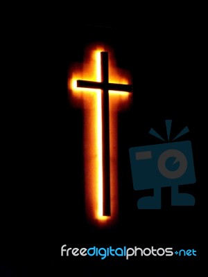 Lighted Holy Cross Stock Photo