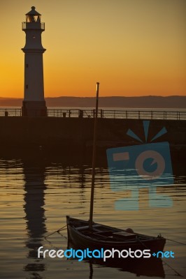 Lighthouse at dusk Stock Photo