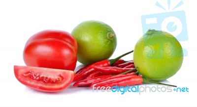 Lime, Tomato, Chilli Isolated On White Background Stock Photo
