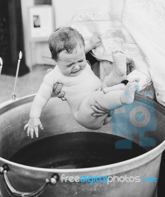 Little Baby Baptism In Church Stock Photo