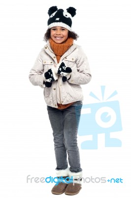 Little Fashionable Girl In Warm Clothes Stock Photo