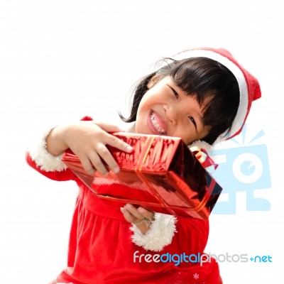 Little Girl Dressed As Santa Claus Stock Photo