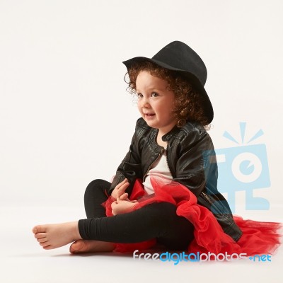 Little Girl Fashion Model With Black Hat Stock Photo
