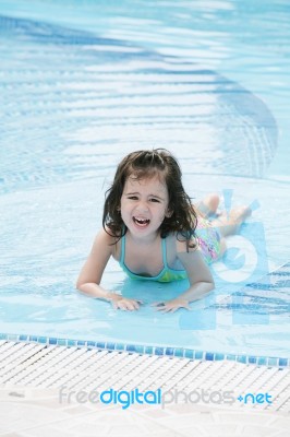 Little Girl In Pool Stock Photo