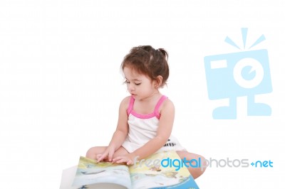 Little Girl Reading Book Stock Photo