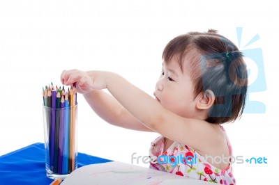 Little Girl Sitting And Choosing Colour Pencil , On White Backgr… Stock Photo