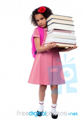 Little Girl With Backpack And Books Stock Photo