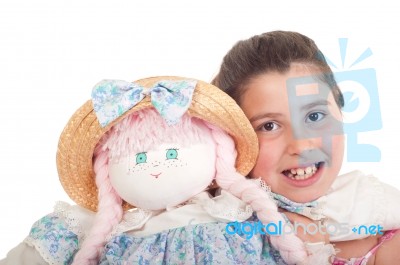 Little Girl With Doll Stock Photo