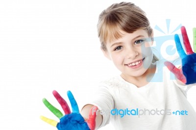 Little Kid With Painted Hands Stock Photo