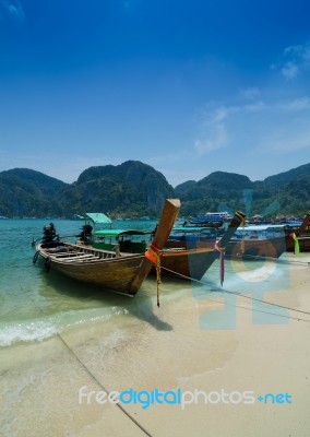 Long Tail Boats At Phi Phi Leh Island, Phuket, Thailand Stock Photo