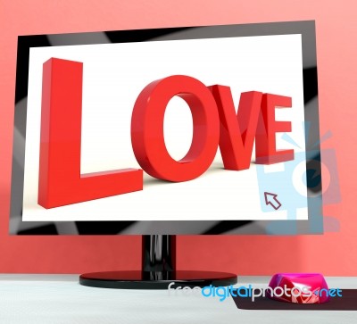 Love Word On Computer Screen Showing Online Dating Stock Image