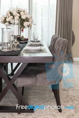 Luxury Dinning Room With Wooden Table And Classic Style Chair Stock Photo