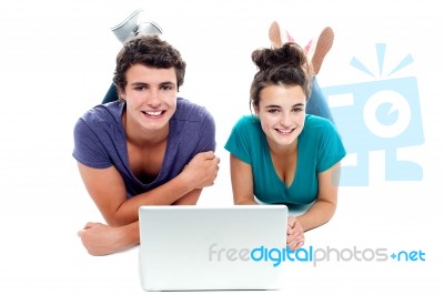 Lying Smiling Young Couples Stock Photo