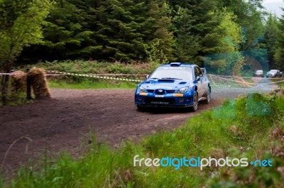 M. Cairns Driving Subaru Impreza Stock Photo