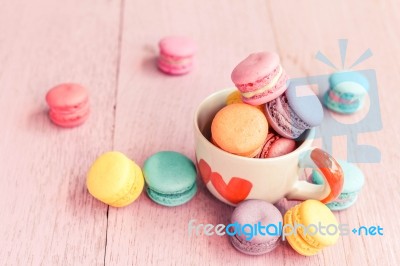 Macarons On Wood Table, Vintage Style Stock Photo