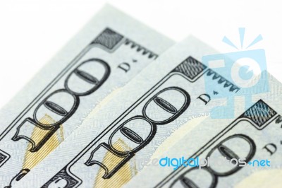 Macro Us Dollars On White Background Stock Photo