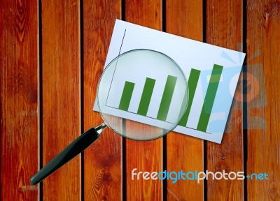 Magnifying Glass Chart Stock Photo