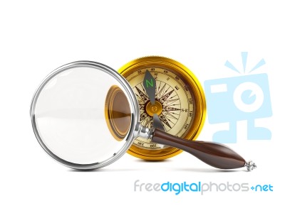 Magnifying Glass Investigate Golden Compass Stock Image