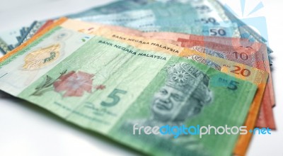 Malaysian Ringgit Currency On White Background Stock Photo