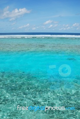 Maldives Scene With Gorgeous Water/cloudscape Stock Photo