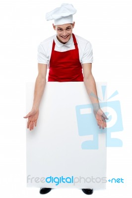 Male Chef Holding Blank Board Stock Photo