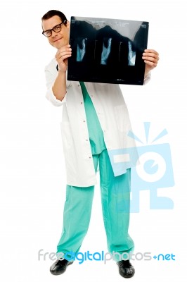Male Doctor holding X Ray Stock Photo