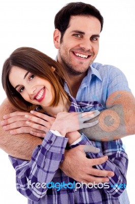 Male Embracing Woman Stock Photo