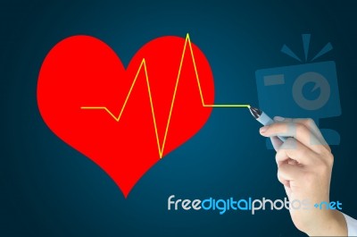 Male Hand Write Heart And Pulse Stock Photo