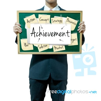 Male Holding Board With Achievement Stock Image