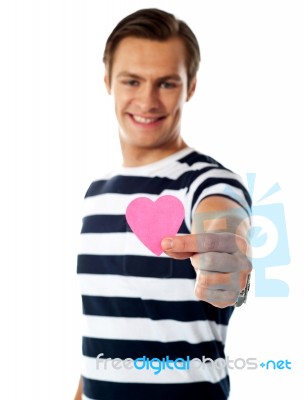 Male holding paper heart Stock Photo