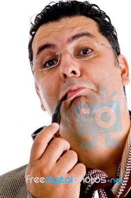 Male Holding Smoking Pipe Stock Photo