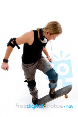 Male In Action On Skateboard Stock Photo