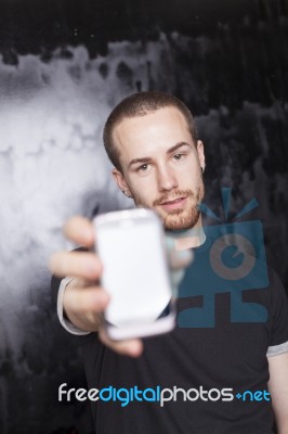 Male Showing Smartphone Stock Photo