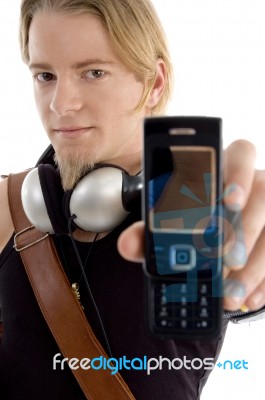 male student Showing cellphone Stock Photo