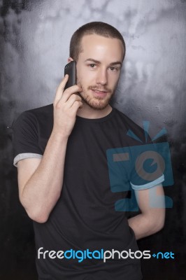 Male talking over phone Stock Photo