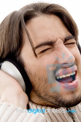 Male Tuned In To Music Stock Photo