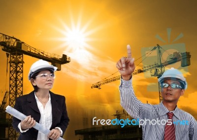Man And Woman In Construction Theme Stock Photo