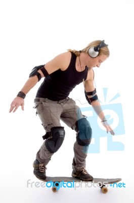 Man Balancing On Skateboard Stock Photo