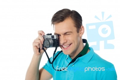 Man Clicking With Digital Camera Stock Photo