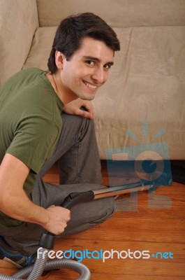 Man Doing The Housework Stock Photo