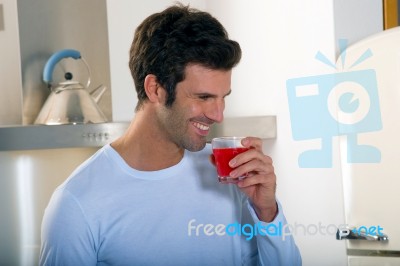 Man Drinking Juice Stock Photo