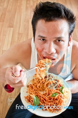 Man Eating Spaghetti Stock Photo